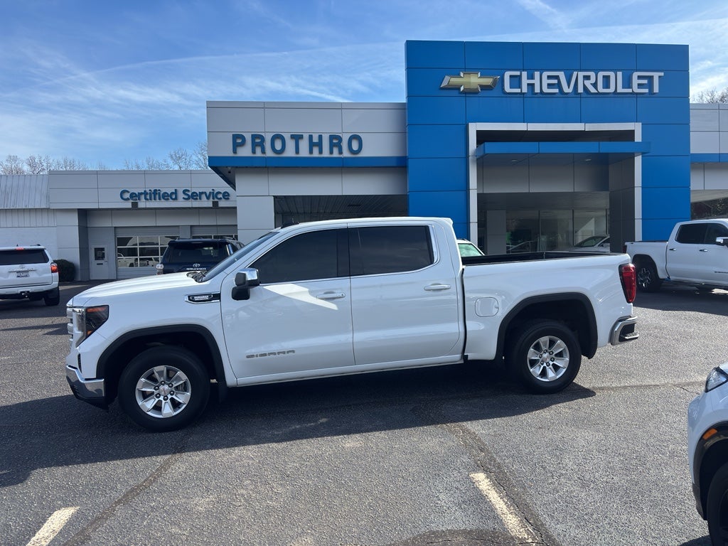 2024 GMC Sierra 1500 SLE in Summit White — front three-quarter view