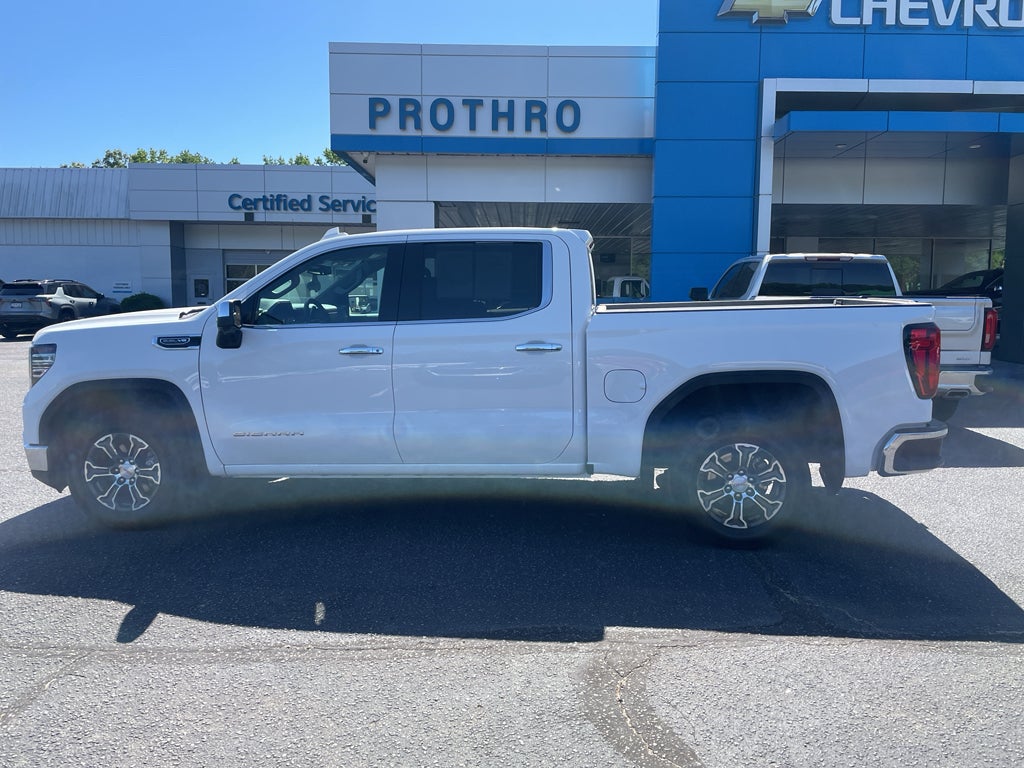 2025 GMC Sierra 1500 SLT in Summit White — front three-quarter view